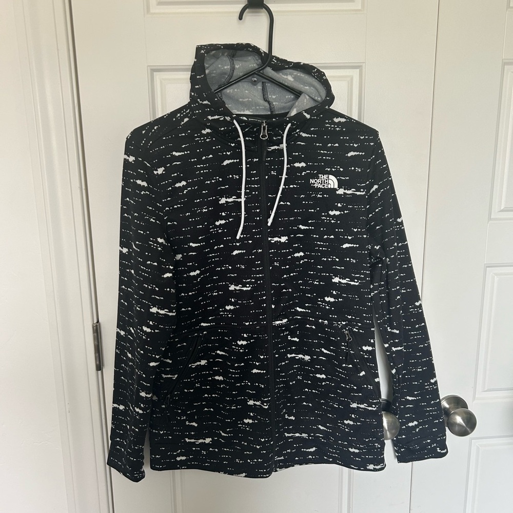 The North Face zip up hooded sweater.